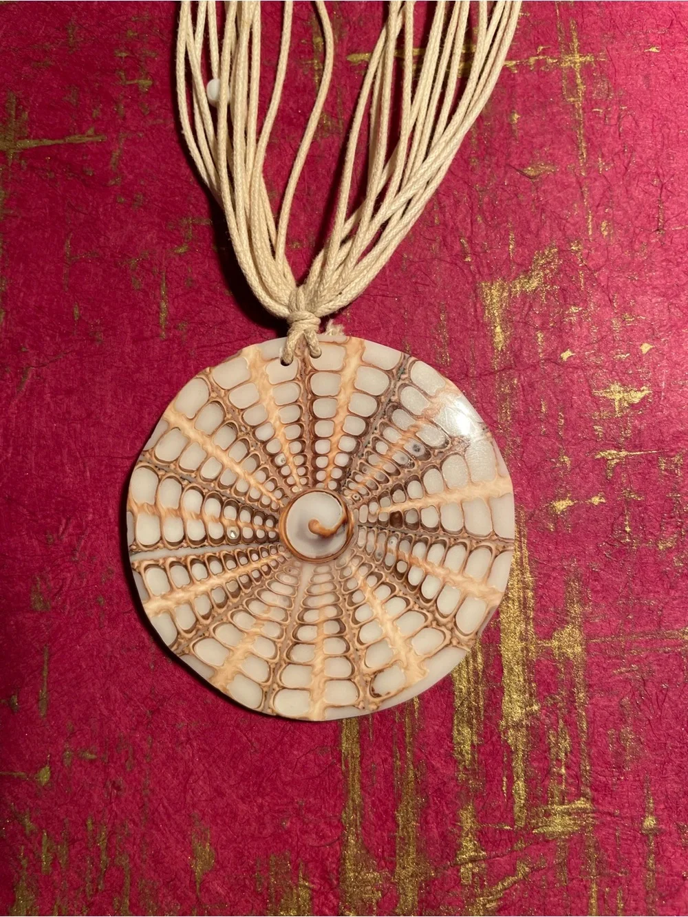 Handcrafted Cream Multi-Strand Necklace with Round Pendant